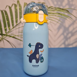 A set of four colorful, insulated stainless steel water bottles designed for children. Each bottle features a flip-top straw lid, cute cartoon animal illustrations (dinosaur, hedgehog, bear chef, elephant with 'E'), the "Cocoa" brand name, and a detachable "LOVELY" patterned shoulder strap. Ideal for keeping drinks cold or warm on the go