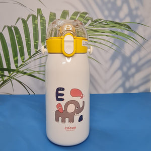 A set of four colorful, insulated stainless steel water bottles designed for children. Each bottle features a flip-top straw lid, cute cartoon animal illustrations (dinosaur, hedgehog, bear chef, elephant with 'E'), the "Cocoa" brand name, and a detachable "LOVELY" patterned shoulder strap. Ideal for keeping drinks cold or warm on the go