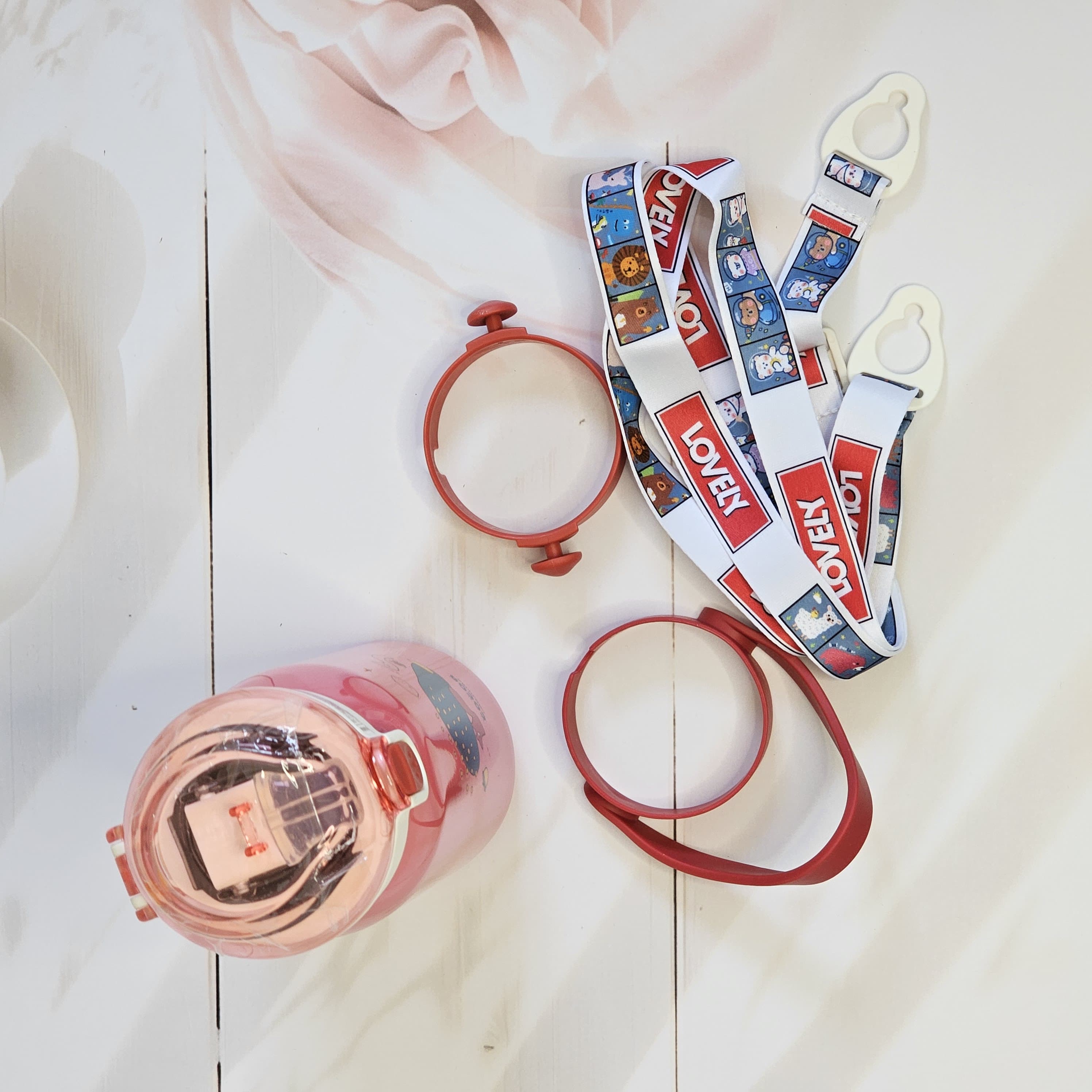 Zentric 530ml insulated water bottle for kids, pink, stainless steel, leak-proof with straw, close lid lock and push to unlock, cartoon snail design, shop now at usmile.toys