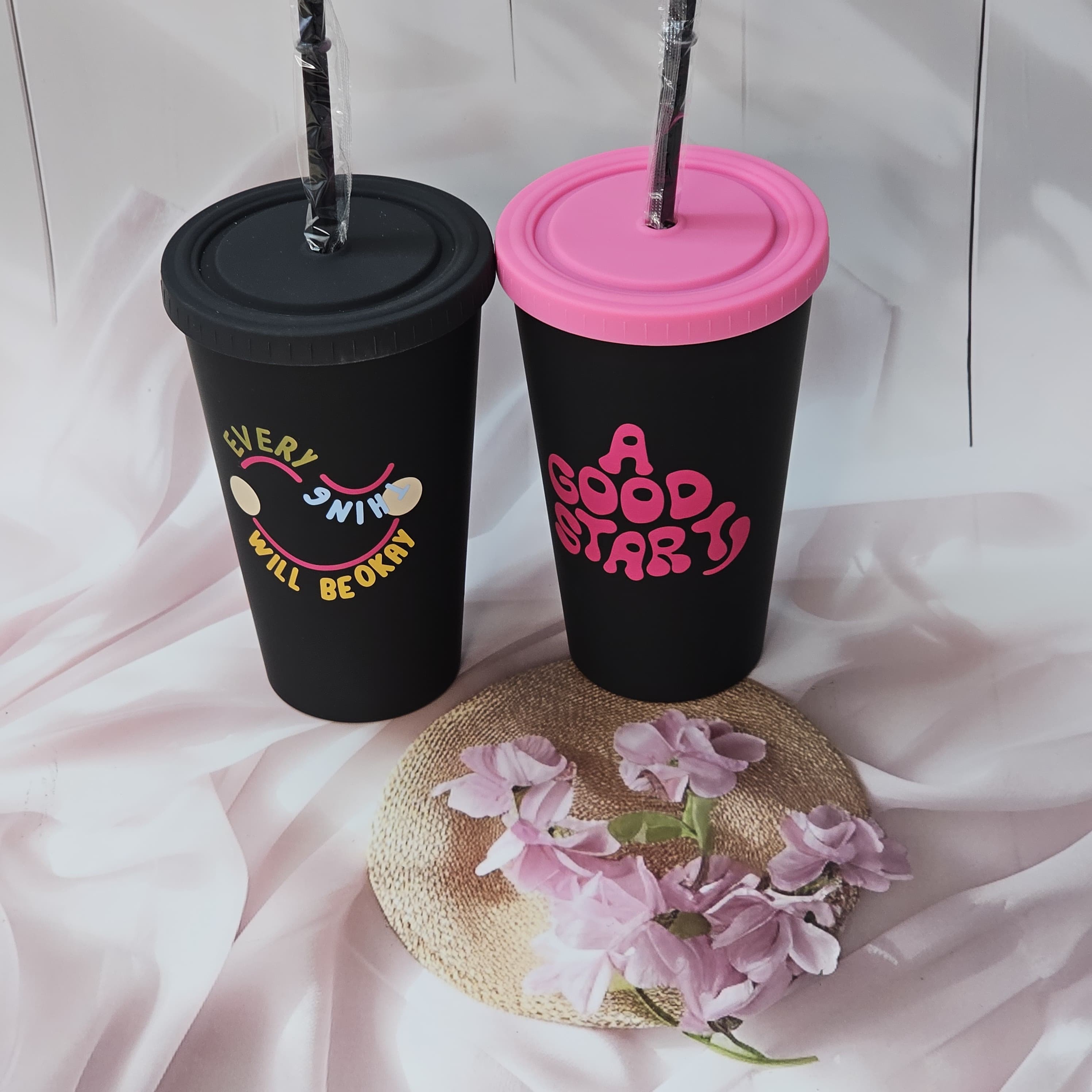 Stylish black sipper cups with motivational quotes and straws, ideal return gifts from usmile.toys